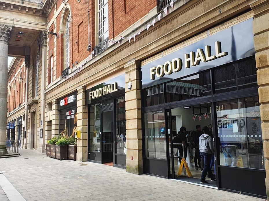 Two retail units containing Peterborough City Market food hall